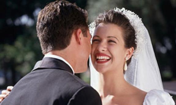 A happy bridal couple after their wedding in St. Augustine.