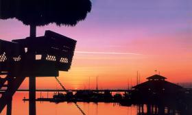 Beautiful view of the Conch House Restaurant at sunset.