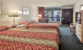 Two double beds guest room at the Ramada Limited. 