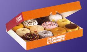 A box of a dozen donuts that are either glazed, frosted, or powdered with sugar 