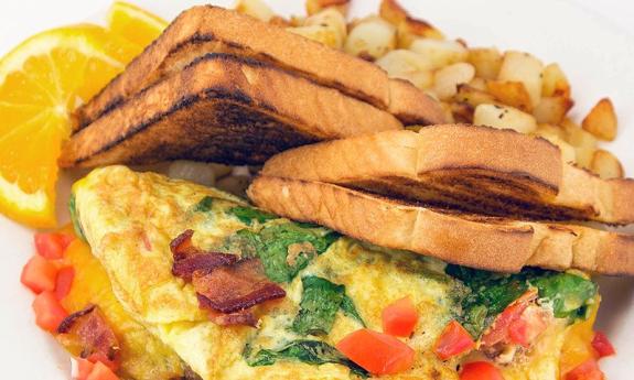 Enjoy a hearty, made-from-scratch omelette with plenty of veggies and sides at Jaybird's Restaurant.