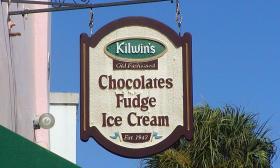 Kilwin's sign hangs up front advertising chocolates, fudge, and ice cream