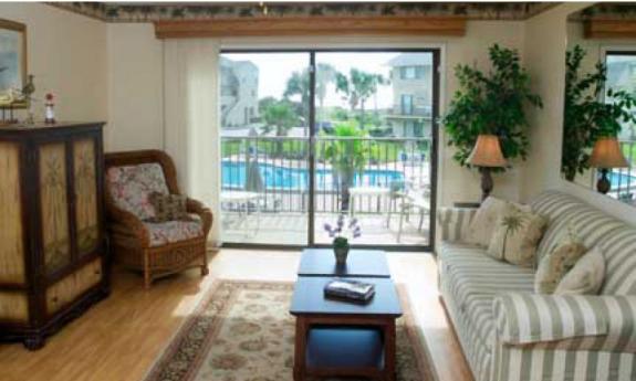 Summer House living space with pool view in St. Augustine, Florida. 