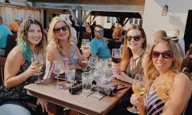 Ladies enjoying wine at the San Sebastian Winery 