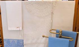 Vintage linen, embroidered and edged in blue, from England to St. Augustine for your shopping pleasure.