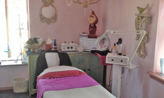 A decorated massage room at Norma Sherry & Co.