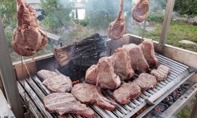 Meat for a crowd being cooked on an Urban Asado grill in St. Augustine.