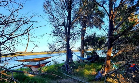 An area for visitors to overlook the water and relax in a hammock