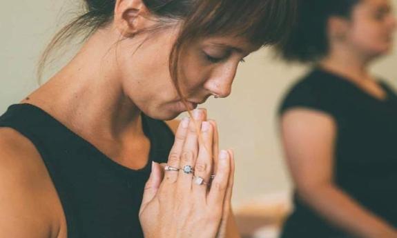 A yoga teacher at Now & Zen Studio in St. Augustine, FL.