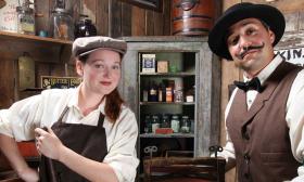 Living history tour guides greet visitors as they go back in time to visit this re-created general store from 1908.