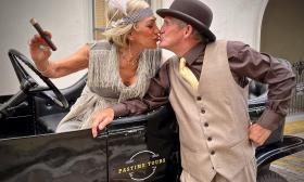 Owners of Pastime Tours enjoy a bit of Roaring 20s hijinks while waiting for their next customers in St. Augustine.