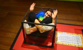 Ripley's Believe It or Not! Museum features a number of interactive exhibits, including one that allows guests to try out their contortionism skills.
