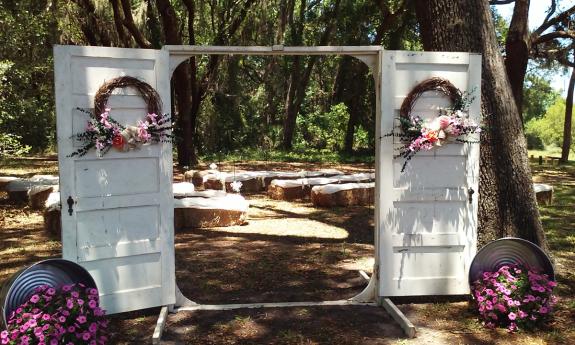 An arrangement to welcome guests at the Riverview Club for an outdoor wedding reception in St. Augustine.