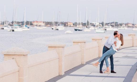 A couple captured by Sarahdipity Photos in historic Downtown, St. Augustine, FL.