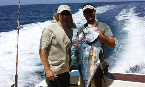 Two happy fishermen aboard one of the Sea Love Charter's boats in St. Augustine.