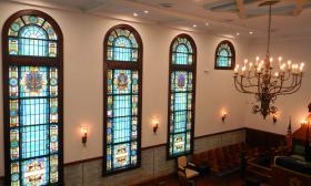The stained-glass windows and chandelier in the First Congregation Sons of Israel in St. Augustine.