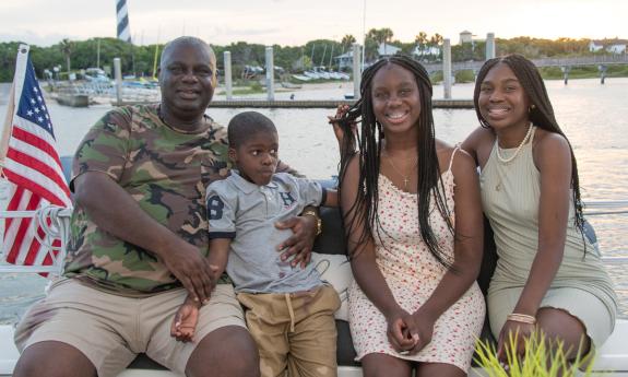 A family enjoying a charter aboard a St. Augustine Sailing boat. 