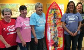 The all-female Jockettes visiting the Surf Culture and History Museum in St. Augustine, FL