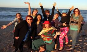 The Adventure Project leading a laughter yoga session for a women's retreat in St. Augustine Beach, FL.