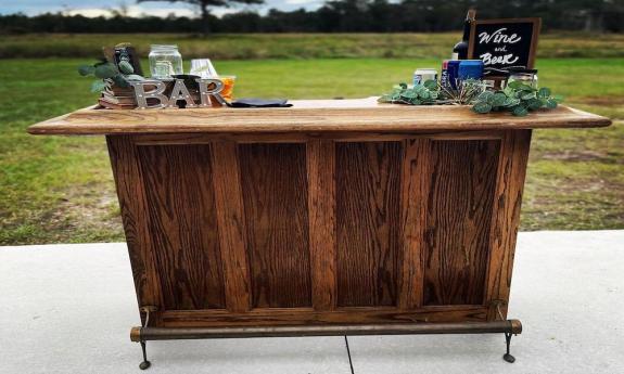 An outdoor bar set up by Toast With Cocktails in St. Augustine, FL.