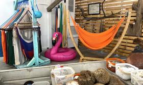 Inside Tom's - in St. Augustine - hammocks and beach toys are on display.
