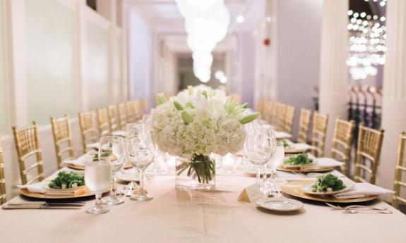 A lovely wedding banquet table arrangement by The Wedding Authority in the Lightner Building in St. Augustine.