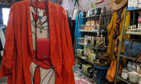 A red jacket and a display of fun items at Wild Heart Boutique in St. Augustine.