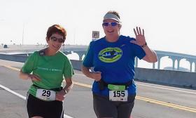 The late and beloved Mardee Jenrette running the Vilano Bridge 5K in 2011 with Carolyn Mudgette. 
