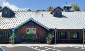The exterior of the V Pizza & Julep in Palm Valley