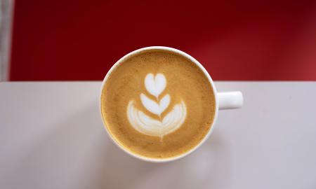 Latte art designed in a coffee mug