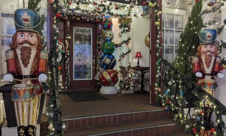 Large nutcracker drummers standing guard at Tini Martini Bar during Nights of Lights