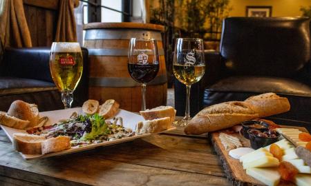 Guests can enjoy their choice of wine or beer and sample some charcuterie in the welcoming lounge of the San Sebastian Winery.