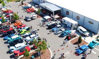 A view from a drone for the Cars & Coffee event featuring antique cars