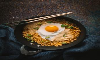 Japanese Ramen is positioned on a table. 