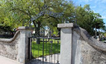 An iron gate marks the entrance to St. Augustine's historic Huguenot Cemetery