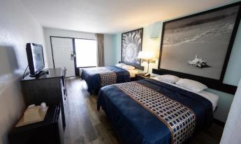 Ocean Breeze Inn - Double queen room with updated decor