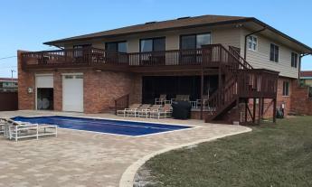 Vacation Rental with backyard pool and patio — Love This Beach Vacation Rentals