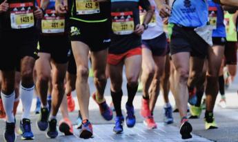 Participants race quickly over asphalt. 