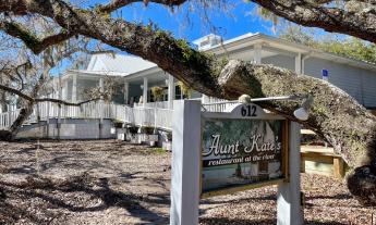 The entrance area to Aunt Kate's under the oaks