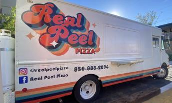 The exterior of the Real Peel Pizza food truck