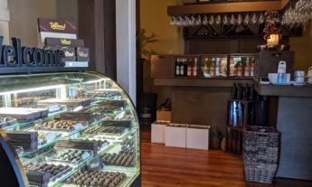 Truffles and wines greet visitors at the entry to Bar Harbor Cheesecake Company in St. Augustine.