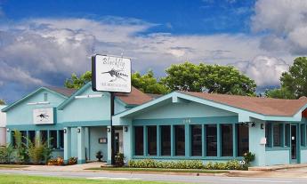 The Bahamian blue exterior of Blackfly the Restaurant in St. Augustine.