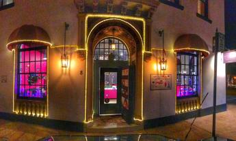 The storefront of Le Macaron is located on Cathedral Place.