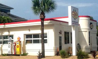 Obi's Fillin' Station is a vintage-car-themed beachside restaurant that serves burgers, beer and more.