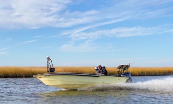 A boat from High Tailin' on the marsh