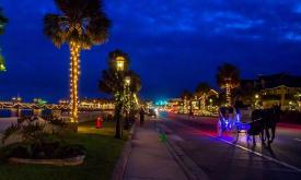 St. Augustine at night with the holiday lights and a carriage