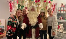 Santa and four tour guests for HoHoHo Tasting Tours