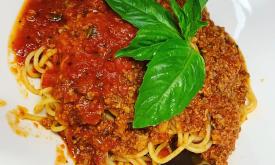 Spagetti with meat sauce and a mint leaf from Poppys Italiano.