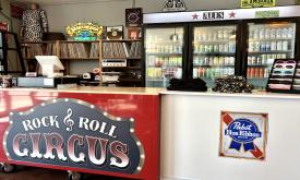 The Rock N Roll CIrcus front counter features canned drinks.