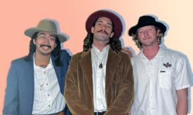 Three musicians smile for the camera in trendy suede suits and hats. Pastel gradient BG.